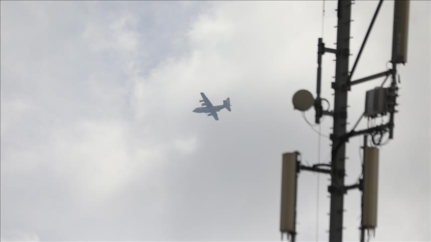 Unidentified aircraft airdrop food aid to Palestinians in southern Gaza