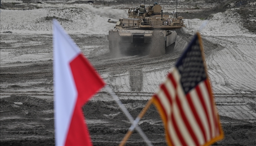 US delivers tanks, armored vehicles to NATO facility in Poland US delivers tanks, armored vehicles to NATO facility in Poland