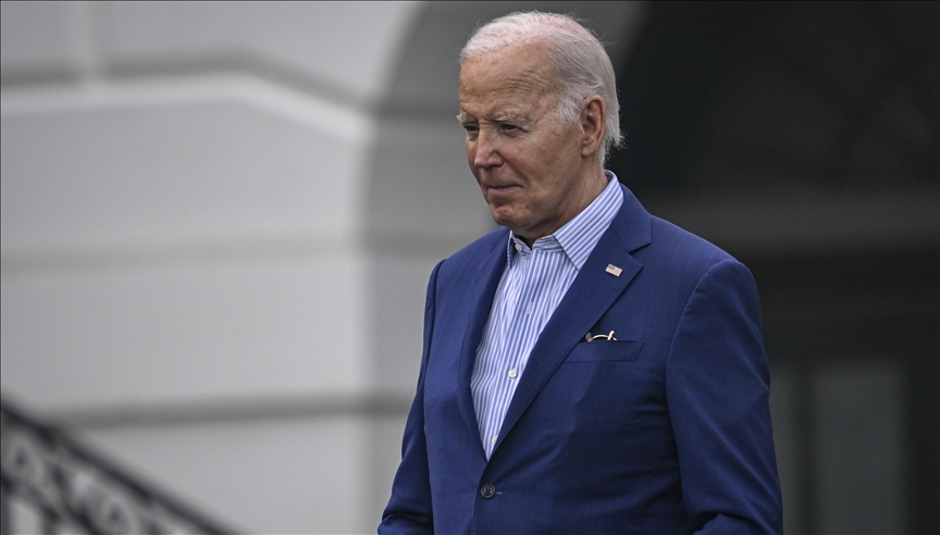 Biden tells Democrats he is 'firmly committed to staying' in presidential race
