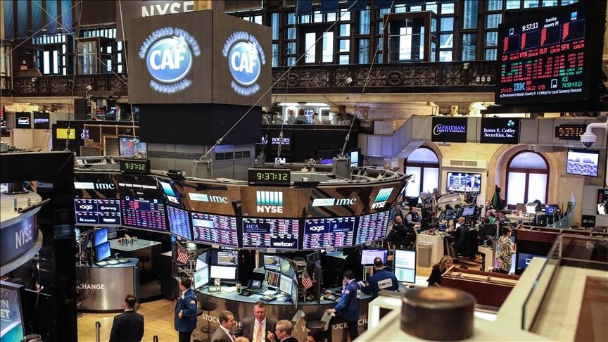 Dow hits new record, US stocks mixed Wednesday
