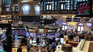 Dow hits new record, US stocks mixed Wednesday