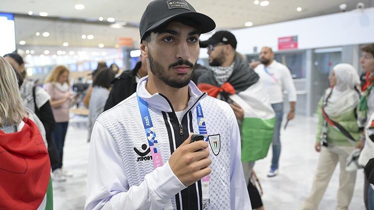 Palestinian boxer Abusal wears shirt with theme of Israel's Gaza attacks at opening of Olympics