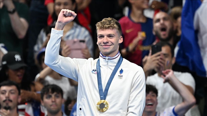French swimmer Marchand wins gold medal with Olympic record French swimmer Marchand wins gold medal with Olympic record