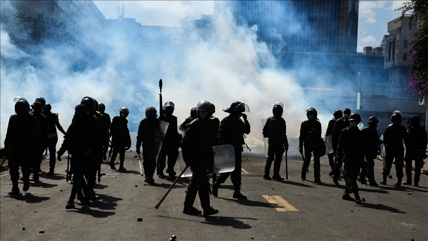 Police use tear gas, arrest over 170 to halt protest march demanding Kenya president's resignation