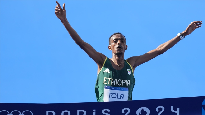 Ethiopia's Tola Tamirat takes marathon gold in Olympic record Ethiopia's Tola Tamirat takes marathon gold in Olympic record