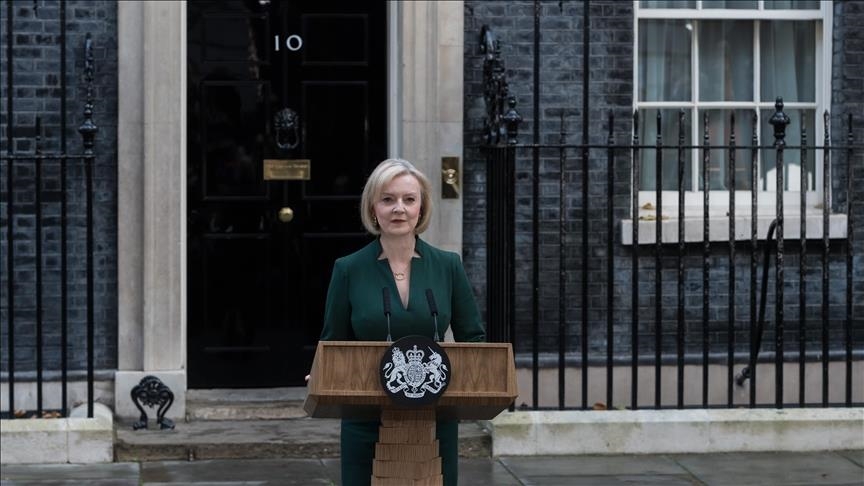 Former British Premier Liz Truss upstaged by prank banner with a facet of lettuce