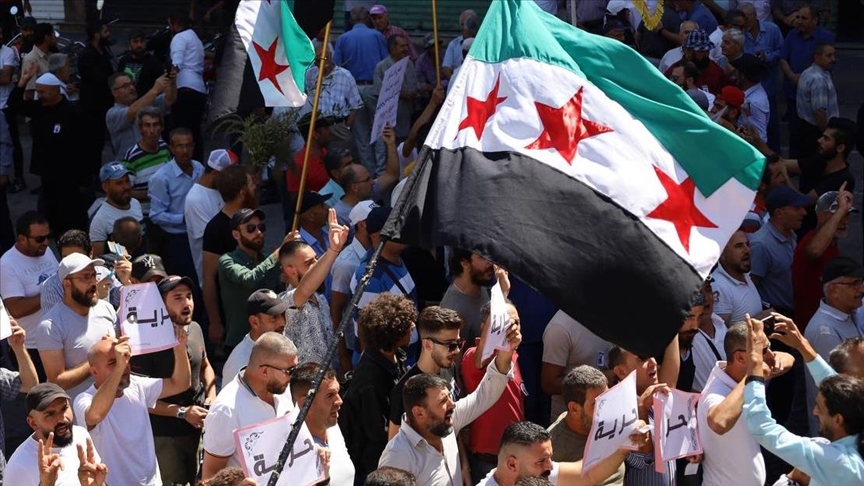 Protesters  in southern Syria  mark 1st anniversary of anti-regime protests