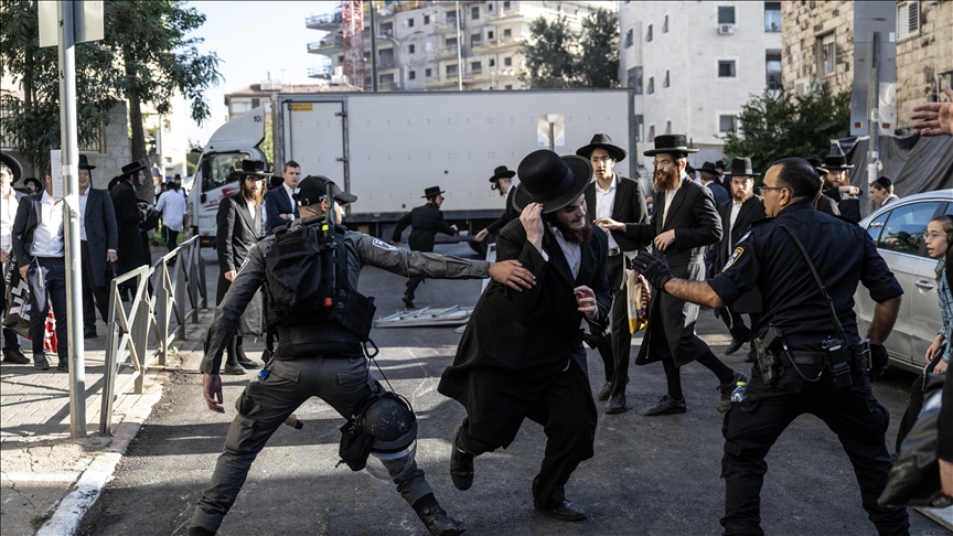 Ultra-Orthodox Jews protest mandatory military service in central Israel