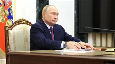 Putin signs law exempting from criminal liability military personnel standing court trial