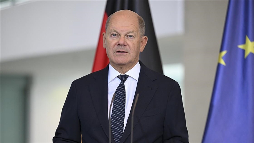 Germany facing tough battle against extremists, says chancellor