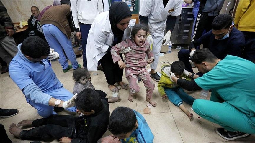 99 US doctors who volunteered to work in Gaza say they have not seen any militant activity in hospitals