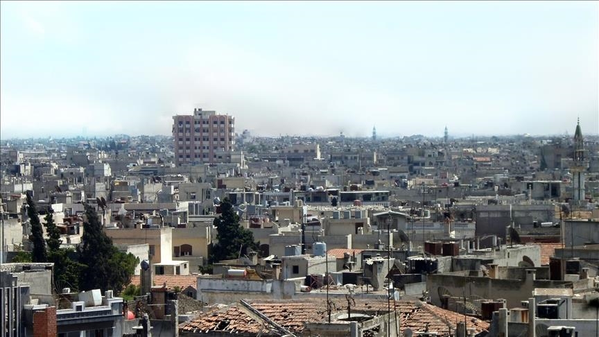 Syrie: Les groupes armés opposés au régime entrent dans les faubourgs du centre-ville de Homs