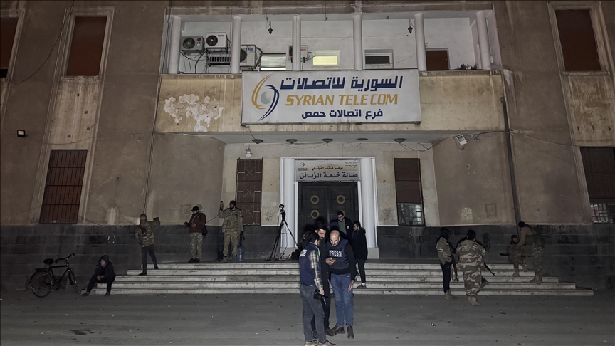 Syrian state TV airs video announcing ouster of Bashar al-Assad, release of all prisoners in jails