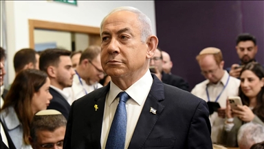 Israeli prime minister denies corruption charges as he takes stand in his trial