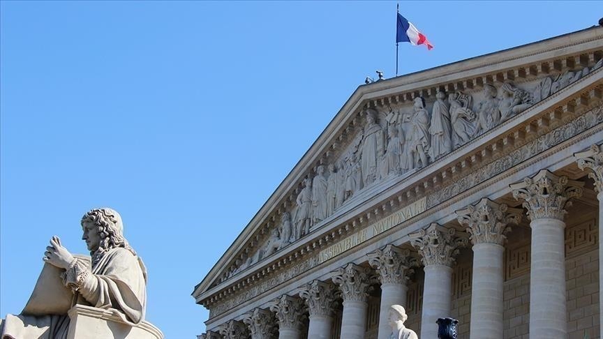 French parliament passes special law to keep essential gov't functions running amid political crisis