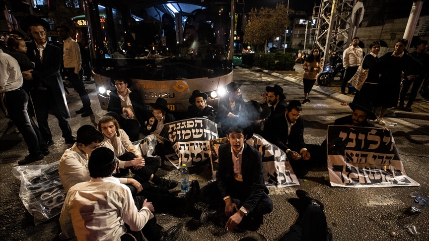Ultra-Orthodox Jews protest mandatory military service in central Israel