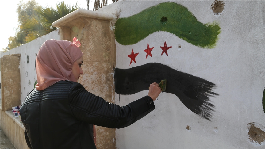 Mladi u Siriji grafitima uklanjaju tragove Assadovog režima