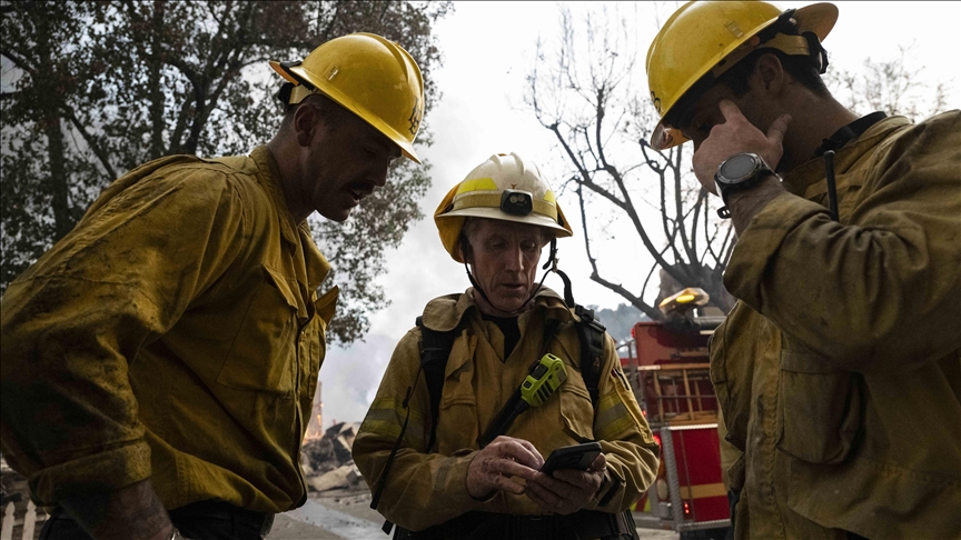 Firefighters make progress against Los Angeles fires as winds calm; dry conditions pose danger