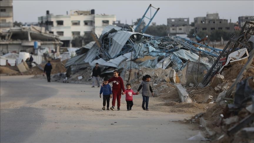 Hamas reaffirms commitment to ceasefire agreement, as Israel says Gaza ceasefire delayed until list of hostages arrives