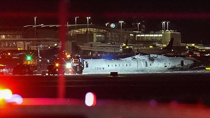 18 people injured after Delta plane flips upside down on landing at Toronto airport