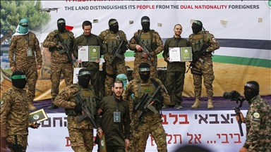 2 Israeli prisoners at handover ceremony in Gaza urge completion of ceasefire deal