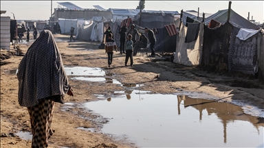 Displaced Gazans struggle in flooded tents on 1st night of holy month