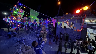 Amid ruins of war, collective suhoor marks start of Ramadan in Gaza’s Khan Younis