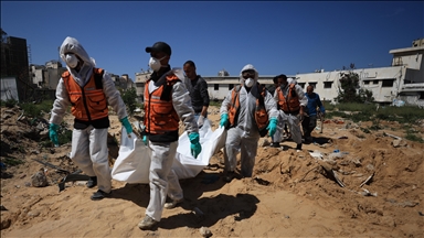 Palestinian Civil Defense teams recover 61 bodies from Shifa Hospital yard in Gaza