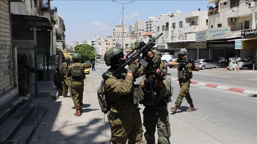Israel kills 13 more Palestinians in Gaza day after one of its worst massacres