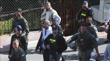 Protesters confront far-right Israeli national security minister, attack his wife in central Israel