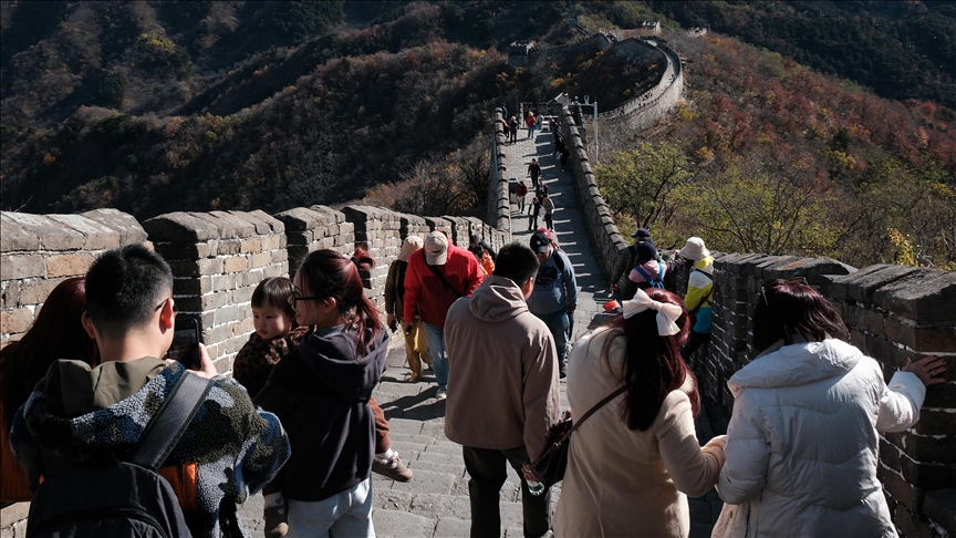 Buzzing with tourists, roof tiles of 650 year old tower collapses in eastern China