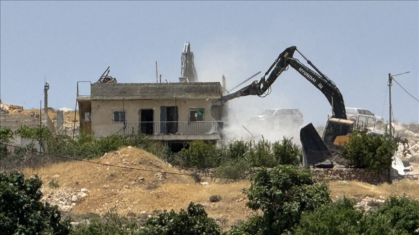 Illegal Israeli settlers torch Palestinian farmlands, army razes structures in occupied West Bank