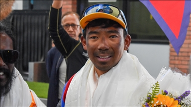 Nepali Sherpa climber breaks world record with 31st Everest summit
