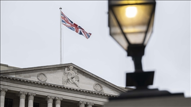 UK growth downgraded as international body warns about fallout from Trump’s trade war