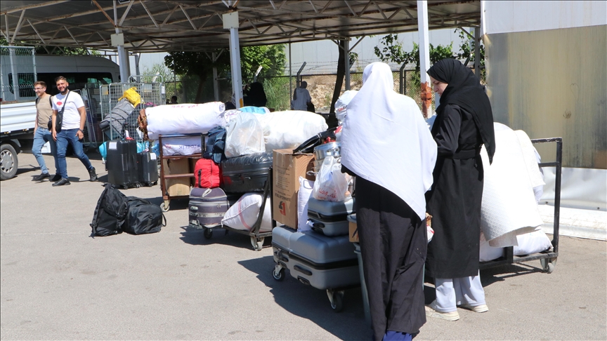 Türkiye'deki Suriyelilerin Kilis'ten ülkelerine dönüşü arife gününde de sürüyor