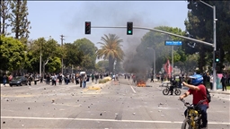 Protesters clash with police in Los Angeles as Trump administration continues immigration raids