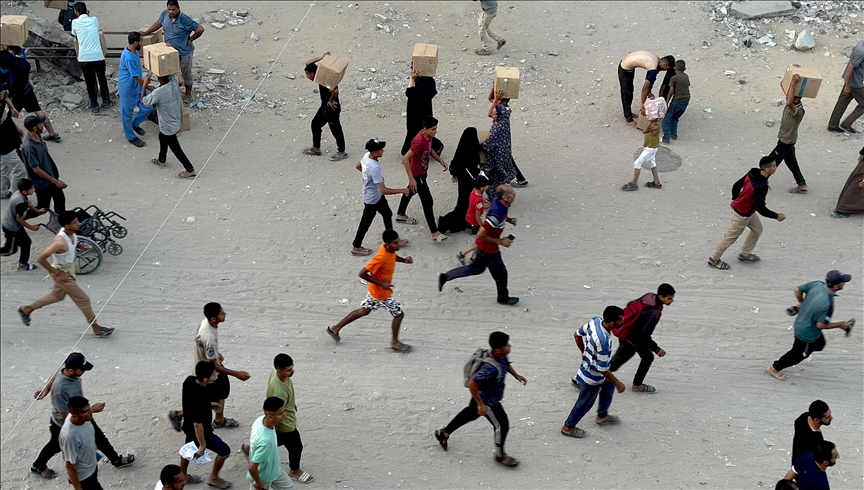 Israel opening fire at Palestinians seeking aid amounts to genocide, say legal experts