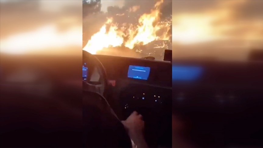 Hatay'da itfaiye aracının orman yangınında alevler arasında kalması cep telefonu kamerasında