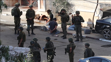 Israeli army detains 35 Palestinians, including children, in West Bank raids