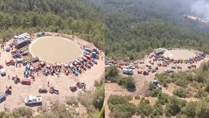 Bursa'da yangın söndürme havuzuna tankerlerle su taşıyan vatandaşlar helikopterleri susuz bırakmadı