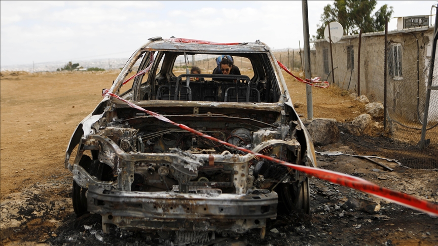 Illegal Israeli settlers torch Palestinian vehicle, spray racist graffiti in new West Bank attack