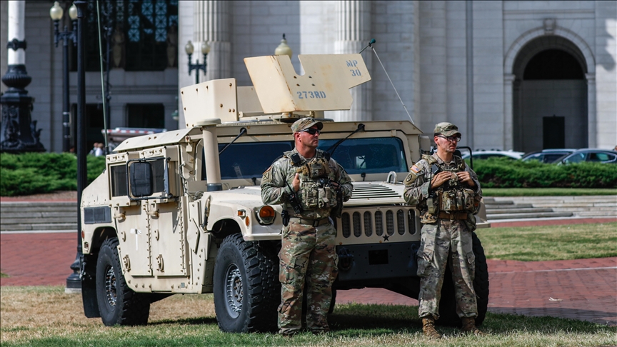 National Guard in Washington, DC begins carrying weapons