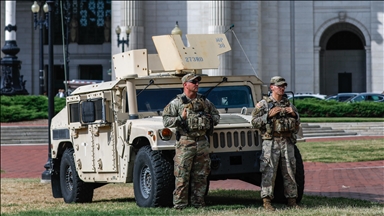 National Guard in Washington, DC begins carrying weapons
