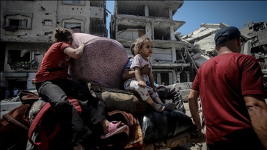 Mass displacement from Gaza City’s northeast begins as Israeli attacks intensify