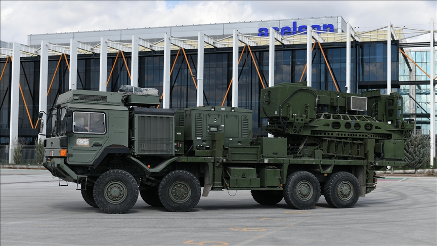 ASELSAN KORAL modernization — land-based electronic warfare ED/EA system on 8x8 truck in front of ASELSAN HQ