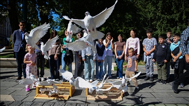 Bosnian children release white doves in memory of kids killed in Israeli genocide in Gaza