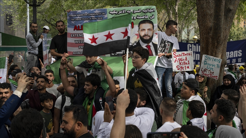Syrians gather outside UN headquarters to welcome President Al-Sharaa in historic appearance
