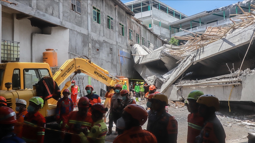 At least 91 students feared trapped after school building collapsed in Indonesia