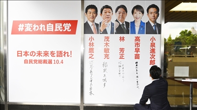 Japan's ruling party concludes members voting to elect new leader