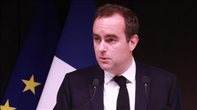 France's outgoing premier says parties show 'sense of responsibility' as talks continue to avoid political crisis